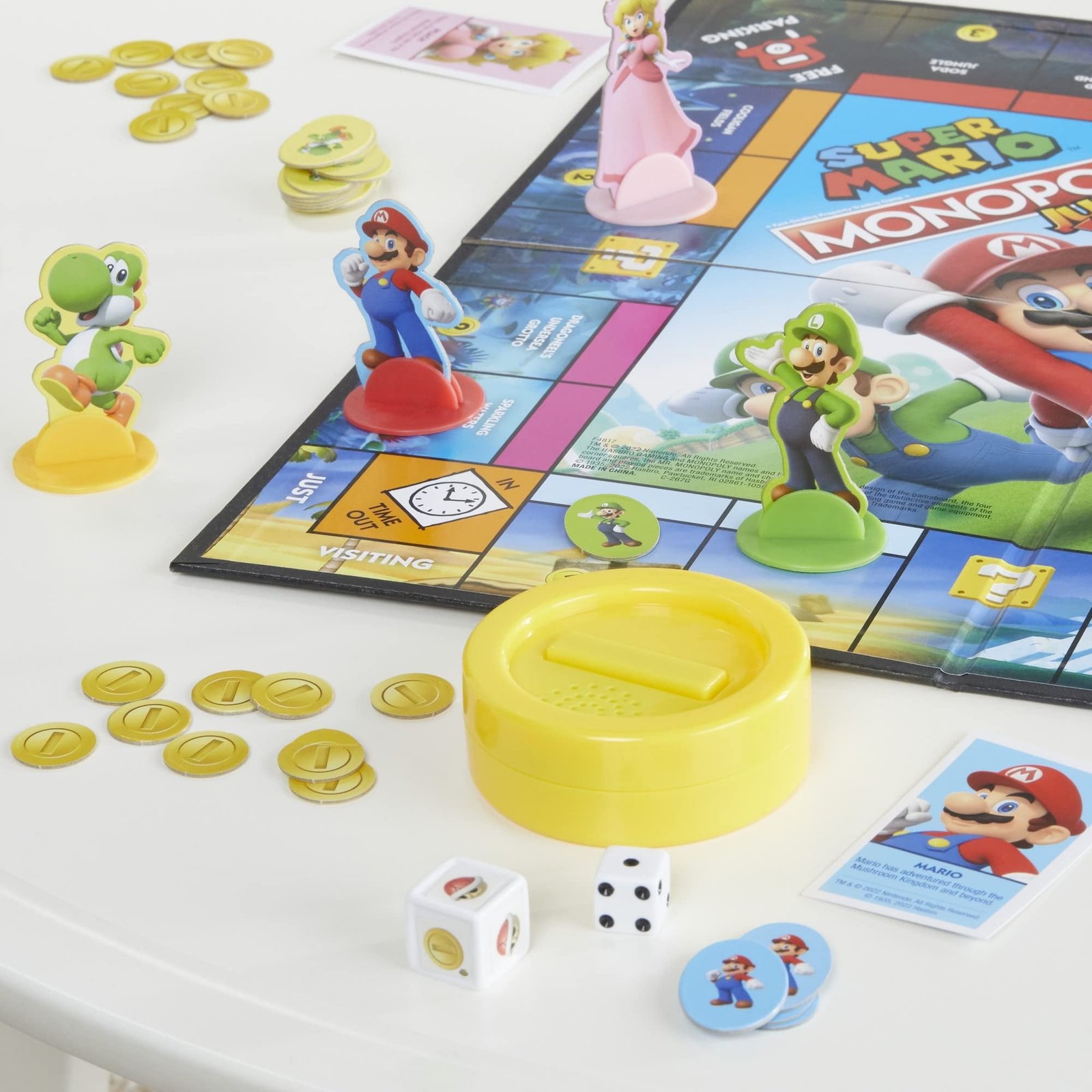 Monopoly Junior Super Mario Edition Board Game, Fun Kids' Ages 5 and Up, Explore The Mushroom Kingdom as Mario, Peach, Yoshi, or Luigi ( Exclusive)