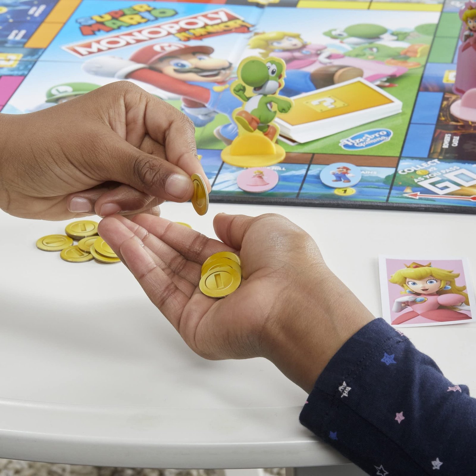 Monopoly Junior Super Mario Edition Board Game, Fun Kids' Ages 5 and Up, Explore The Mushroom Kingdom as Mario, Peach, Yoshi, or Luigi ( Exclusive)