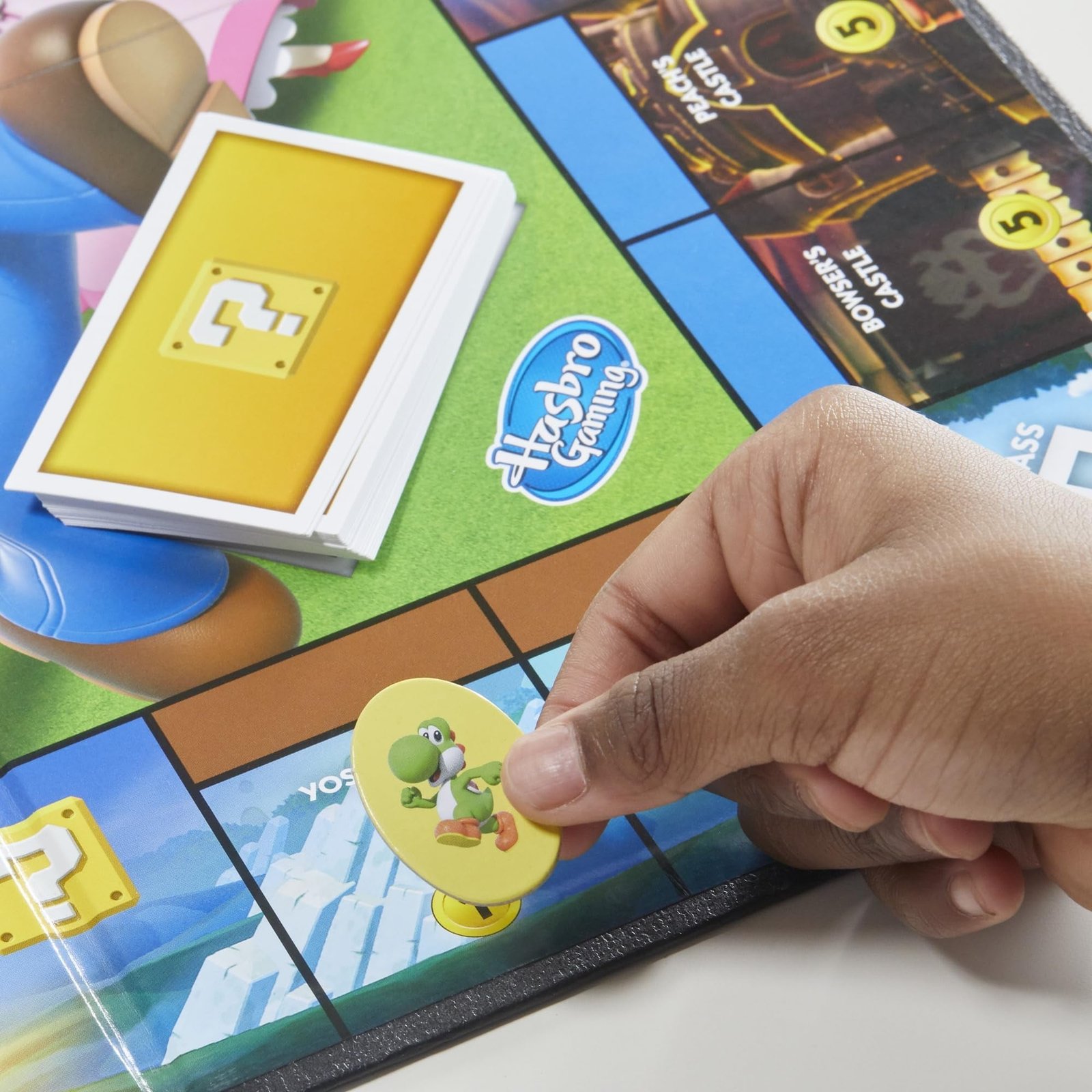 Monopoly Junior Super Mario Edition Board Game, Fun Kids' Ages 5 and Up, Explore The Mushroom Kingdom as Mario, Peach, Yoshi, or Luigi ( Exclusive)