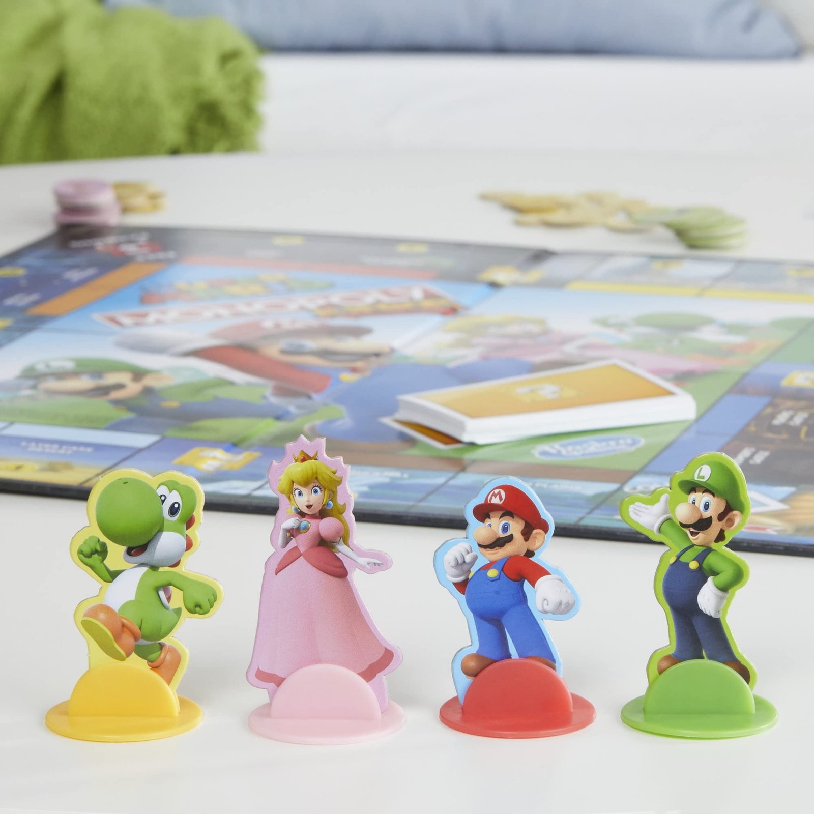 Monopoly Junior Super Mario Edition Board Game, Fun Kids' Ages 5 and Up, Explore The Mushroom Kingdom as Mario, Peach, Yoshi, or Luigi ( Exclusive)